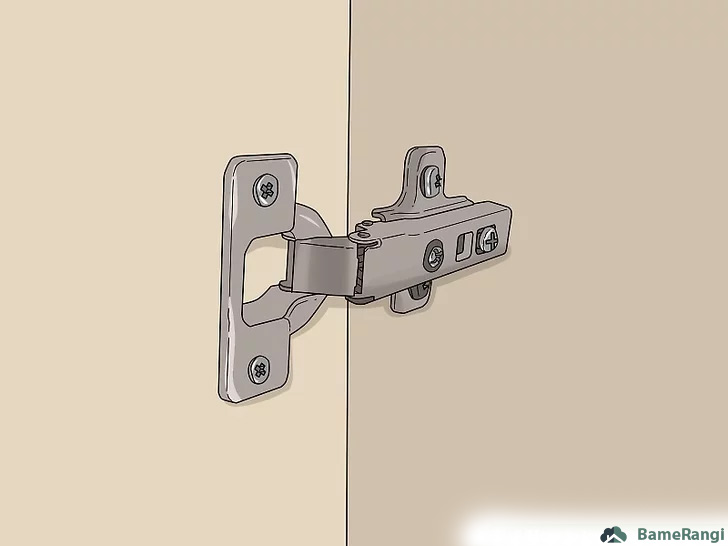نمای نزدیک از لولای مخفی نصب شده روی درب و بدنه کابینت